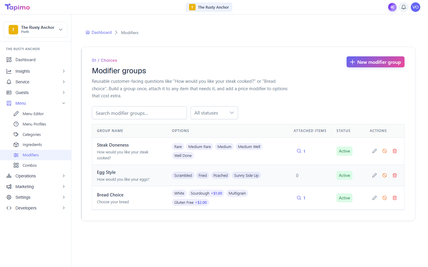 The Modifiers screen, listing reusable modifier groups such as Steak Doneness and Bread Choice with their options and attached-item counts.